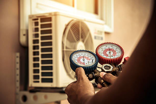 Professional Heat Pump Repair technician working in Warrenville, IL